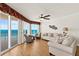 Bright and airy living room featuring ocean views and comfortable seating at 2901 S Atlantic Ave # 401, Daytona Beach Shores, FL 32118