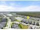 Two-story home perfectly positioned within a community that features serene water views and landscaped surroundings at 2916 Meleto Blvd, New Smyrna Beach, FL 32168