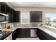 Well-appointed kitchen with granite countertops, stainless steel appliances, and ample cabinet space at 2916 Meleto Blvd, New Smyrna Beach, FL 32168