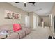 Neutral toned living room features a comfortable couch and decorative accents at 2916 Meleto Blvd, New Smyrna Beach, FL 32168