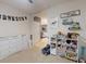 Bedroom with changing table, organizers, and decorations at 2919 Sime St, New Smyrna Beach, FL 32168