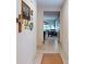 Hallway with decorations leading into a dining and living space at 2919 Sime St, New Smyrna Beach, FL 32168