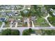 An aerial view of the property in its neighborhood showing nearby homes at 2980 Lockwood Blvd, Deltona, FL 32738