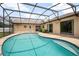 Screened pool and patio area offering sun exposure and privacy at 2980 Lockwood Blvd, Deltona, FL 32738