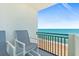 Balcony seating overlooks sandy beach and ocean at 2987 S Atlantic # 1403, Daytona Beach Shores, FL 32118