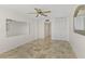 Bright living area with tile floors, mirrored walls, large closet and direct access to hall at 2987 S Atlantic # 1403, Daytona Beach Shores, FL 32118