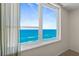 Enjoy views of the beach and ocean from this condo's large picture window at 2987 S Atlantic # 1403, Daytona Beach Shores, FL 32118