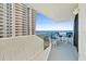 Balcony showing stunning ocean and building views with outdoor seating at 2987 S Atlantic # 606, Daytona Beach Shores, FL 32118