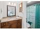 Bathroom features a wooden vanity with a granite countertop at 2987 S Atlantic # 606, Daytona Beach Shores, FL 32118