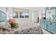 Bright bedroom with large windows, stylish decor, and a comfortable bed at 2987 S Atlantic # 606, Daytona Beach Shores, FL 32118