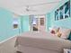 Bedroom with seafoam-colored walls leading to a balcony and ocean view at 2987 S Atlantic # 606, Daytona Beach Shores, FL 32118