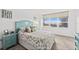 Bright bedroom features a seaside theme and views of the city at 2987 S Atlantic # 606, Daytona Beach Shores, FL 32118