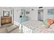 Seaside-themed bedroom connecting to a bathroom with granite vanity at 2987 S Atlantic # 606, Daytona Beach Shores, FL 32118