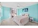 Bedroom with seafoam-colored walls leading to a balcony and ocean view at 2987 S Atlantic # 606, Daytona Beach Shores, FL 32118