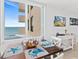The dining area offers an ocean view from the table while relaxing inside at 2987 S Atlantic # 606, Daytona Beach Shores, FL 32118