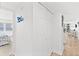 Hallway with neutral colors and convenient access to bedroom and living areas at 2987 S Atlantic # 606, Daytona Beach Shores, FL 32118