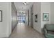 Condo lobby with elevators, chandlers and a seating area at 2987 S Atlantic # 606, Daytona Beach Shores, FL 32118