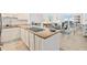 Bright kitchen featuring an open layout with granite countertops at 2987 S Atlantic # 606, Daytona Beach Shores, FL 32118