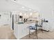 Modern kitchen with stainless steel appliances, granite countertops, and breakfast bar seating at 2987 S Atlantic # 606, Daytona Beach Shores, FL 32118