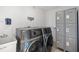 Community laundry room with washers, dryers, and storage lockers at 2987 S Atlantic # 606, Daytona Beach Shores, FL 32118