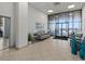 Bright lobby area with tile flooring, comfortable seating, and direct access to outdoor views at 2987 S Atlantic # 606, Daytona Beach Shores, FL 32118