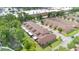 Townhome community offering garages, back patios, and convenient parking at 302 Tammie Sue Ln, Deland, FL 32724