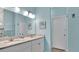 Bathroom with a double vanity, granite countertops, and bright lighting at 302 Tammie Sue Ln, Deland, FL 32724