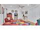 Spacious bonus room with comfortable seating, TV, and natural light at 302 Tammie Sue Ln, Deland, FL 32724