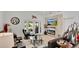 Chic living room with a decorative fireplace, mounted TV, backyard access, and sleek modern decor at 302 Tammie Sue Ln, Deland, FL 32724