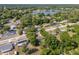 Nice aerial view of homes and wooded areas close to a scenic lake at 31 Lake Dr, Debary, FL 32713