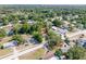 Picturesque aerial shot showcases the property's lush surroundings and neighborhood streets at 31 Lake Dr, Debary, FL 32713