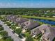 Aerial view of a neighborhood with a lake at 3148 Bailey Ann Dr, Ormond Beach, FL 32174