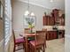 Cozy breakfast nook featuring a round table, four chairs, and natural lighting at 3148 Bailey Ann Dr, Ormond Beach, FL 32174