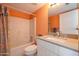 Bathroom with tub, toilet, and modern vanity with a clean, inviting design at 3170 Ocean Shore Blvd # 5010, Ormond Beach, FL 32176