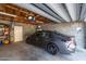Attached garage with storage shelves and space for parking at 3170 Ocean Shore Blvd # 5010, Ormond Beach, FL 32176