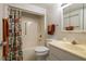 Simple bathroom features a tub with a shower, a toilet and single sink at 325 Wilder Blvd # A102, Daytona Beach, FL 32114