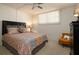 Bright, airy bedroom with carpet, a window, and neutral walls at 325 Wilder Blvd # A102, Daytona Beach, FL 32114