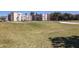 Stunning view of the golf course and community building on a sunny day at 325 Wilder Blvd # A102, Daytona Beach, FL 32114