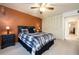 Comfortable bedroom features warm wall color, carpet, and neutral closets at 325 Wilder Blvd # A102, Daytona Beach, FL 32114