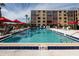 Enjoy the sunshine at this pristine community pool with lounge chairs and umbrellas at 325 Wilder Blvd # A102, Daytona Beach, FL 32114