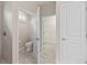 This bathroom features a shower stall with tiled walls and a toilet at 3402 Torre Blvd, New Smyrna Beach, FL 32168
