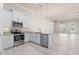 Well-appointed kitchen with stainless appliances, granite countertops, and modern fixtures at 3402 Torre Blvd, New Smyrna Beach, FL 32168
