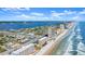 Beautiful aerial view of the city's coastline, showcasing the beach, buildings, and ocean at 3425 S Atlantic Ave # 1602, Daytona Beach, FL 32118