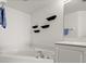 Bright bathroom featuring a soaking tub with whirlpool jets and clean finishes at 3425 S Atlantic Ave # 1602, Daytona Beach, FL 32118