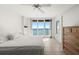 Bedroom with ocean views, tile floors, and neutral tones for a relaxing atmosphere at 3425 S Atlantic Ave # 1602, Daytona Beach, FL 32118