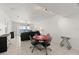 Bright dining area with ocean view, table, and modern lighting at 3425 S Atlantic Ave # 1602, Daytona Beach, FL 32118
