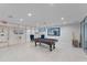 Community billiards room with a classic pool table and comfortable seating for residents at 3425 S Atlantic Ave # 1602, Daytona Beach, FL 32118