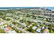 Aerial view displays the home's location in a neighborhood near coastal areas and a river at 355 Hartford Ave, Daytona Beach, FL 32118