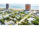 Aerial view shows the home's proximity to beaches and surrounding neighborhood at 355 Hartford Ave, Daytona Beach, FL 32118