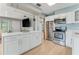 Open kitchen with stainless steel appliances, and a large breakfast bar at 355 Hartford Ave, Daytona Beach, FL 32118